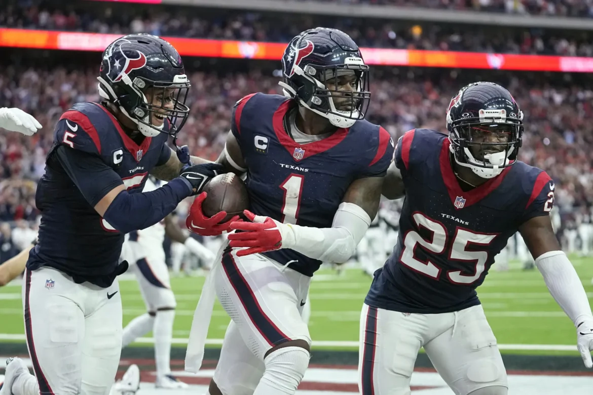 Texans-safety-Jimmie-Ward-celebrates-a-game-winning-interception-in-the-endzone-2048×1365.jpg